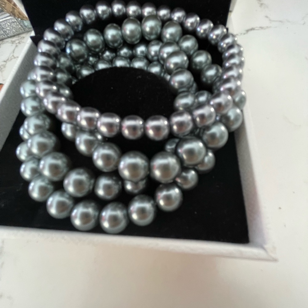 Four grey tone Pearl bead bracelets.